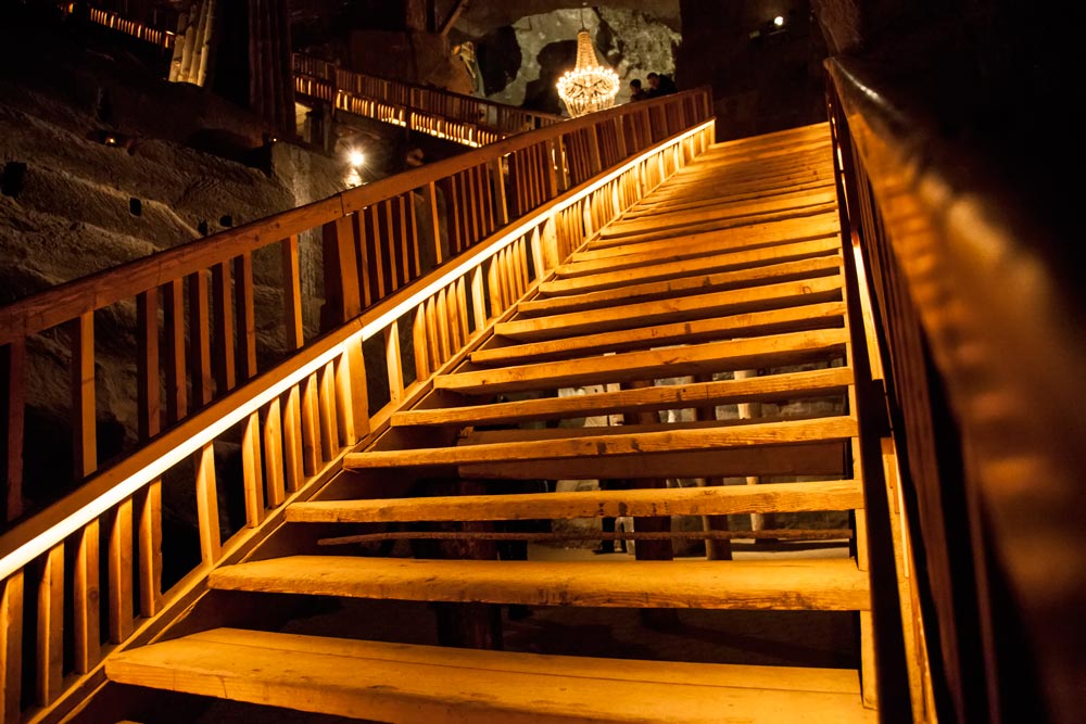 set of wooden steps leading up from a mine shaft