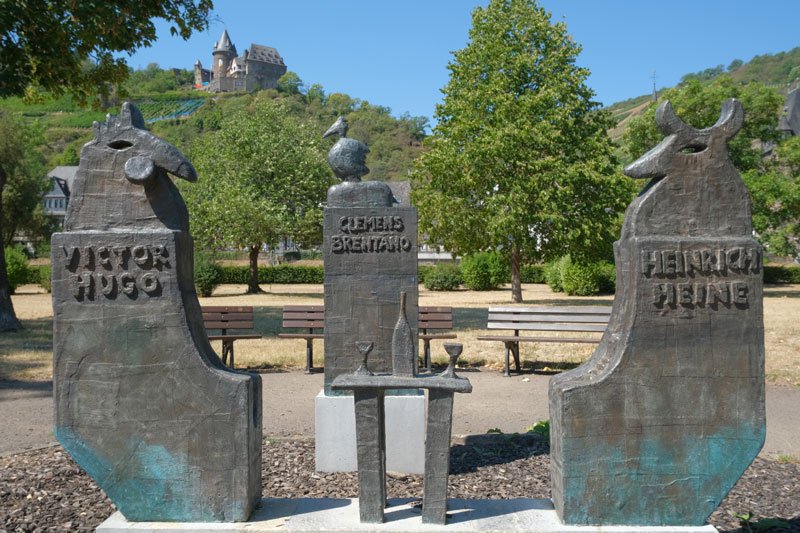 modern sculpture commemorating three writers