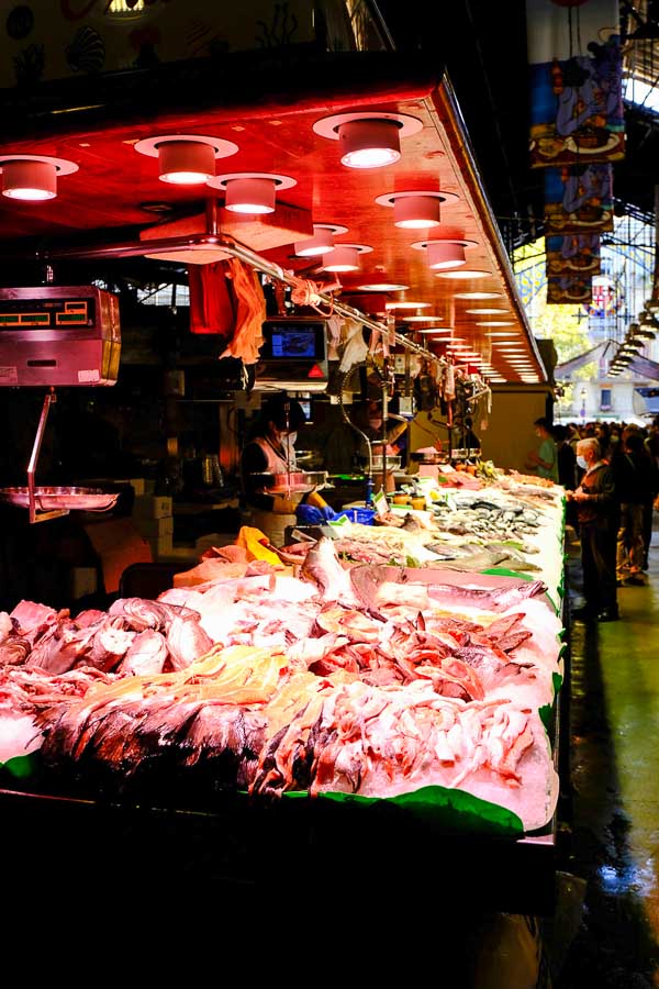 illuminated fish stall in market