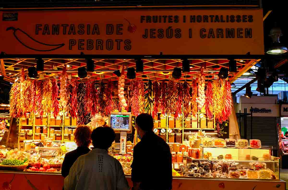 three people at food market stall