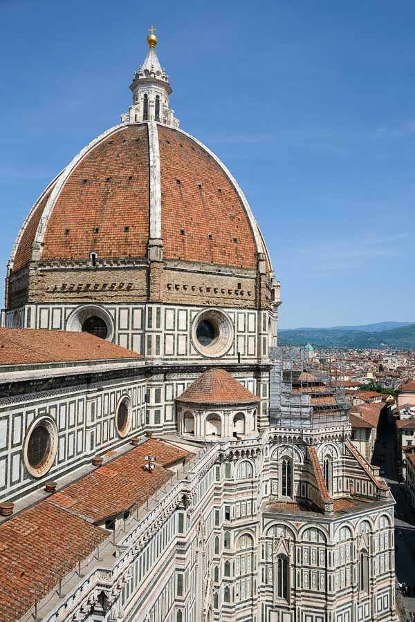 red dome and marble facade of florence cathedral