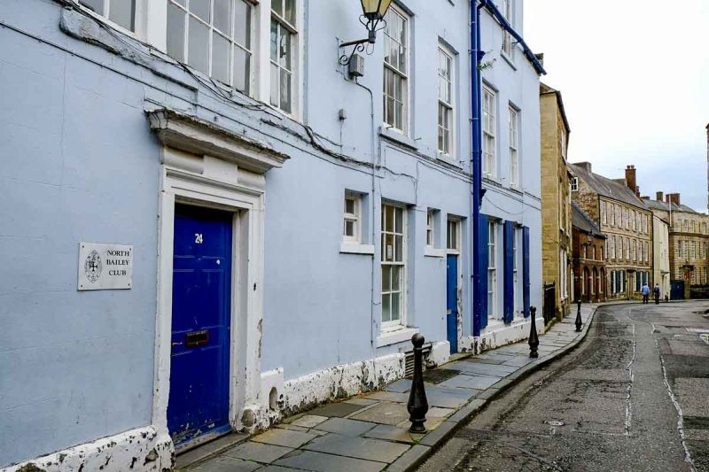 old pale blue painted houses in durham england