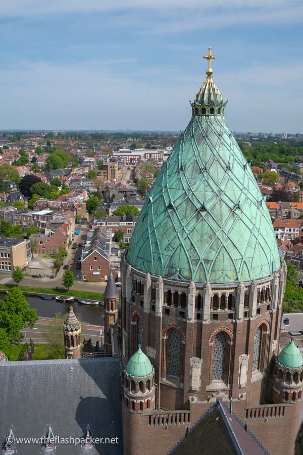 copper dome of st bavo cathedral and the canal and rooftops of haarelm