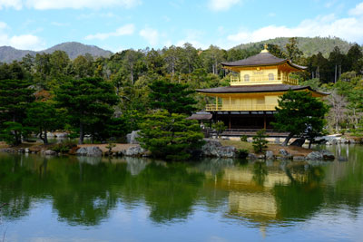 kinkakuji temple reflected in water in kyoto japan