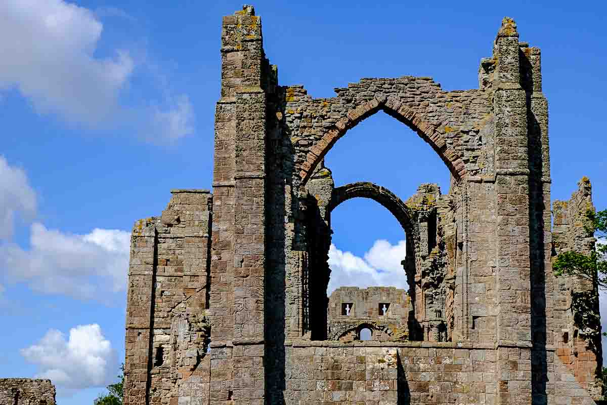 Lindisfarne Priory against blue sky