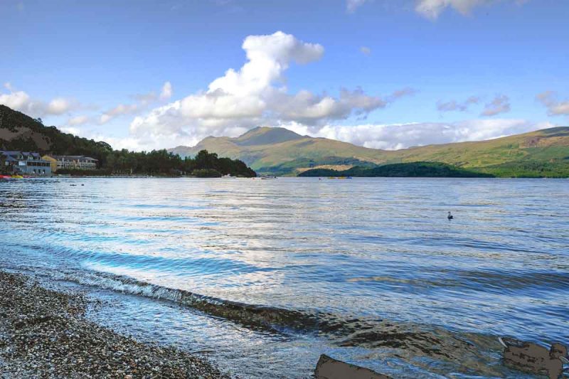 lake with mountain at loch lomond one of the best day trips from edinburgh by train