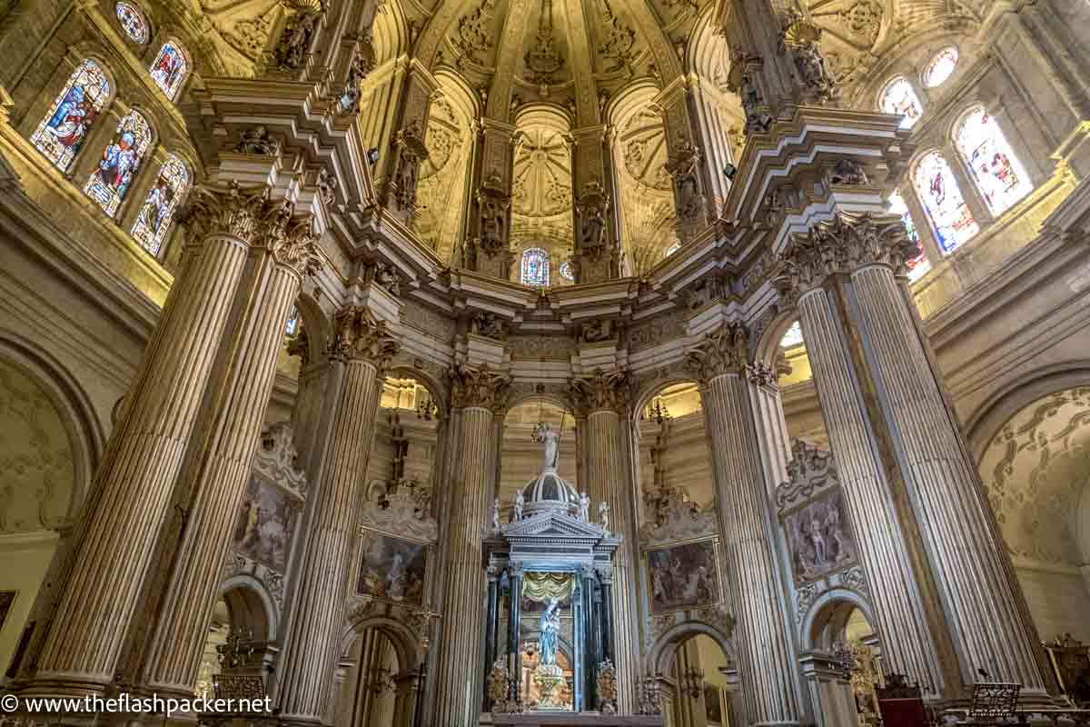 interior of cathedral with soaring columns and alcoves