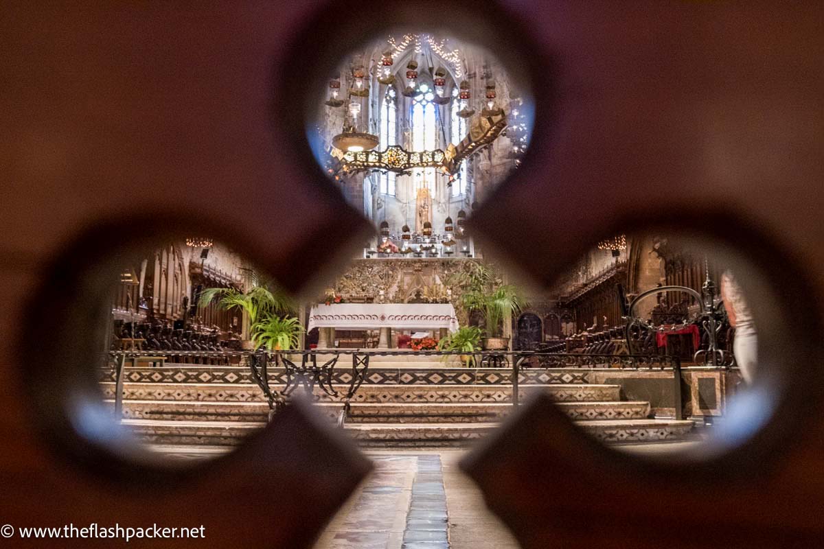 cathedral altar viewed through key shaped carving