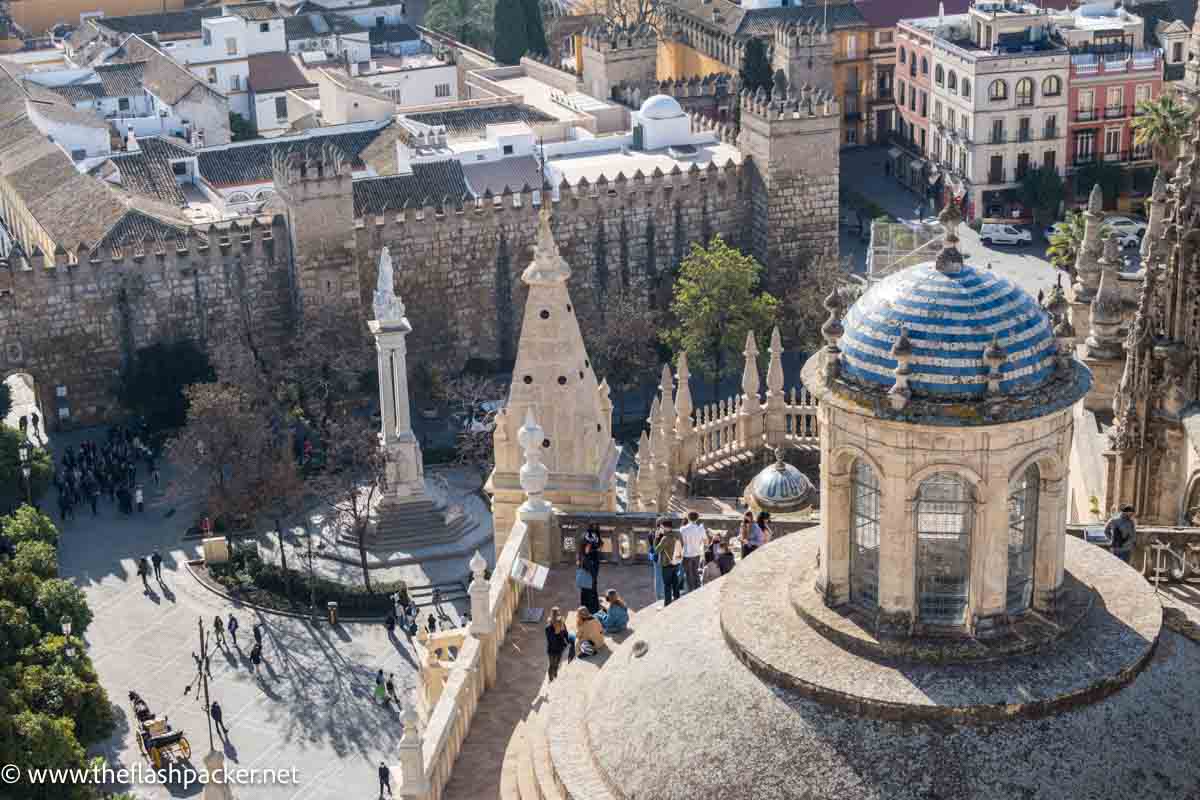 aerial view of dome of seville cathedral and plaza and alcazar