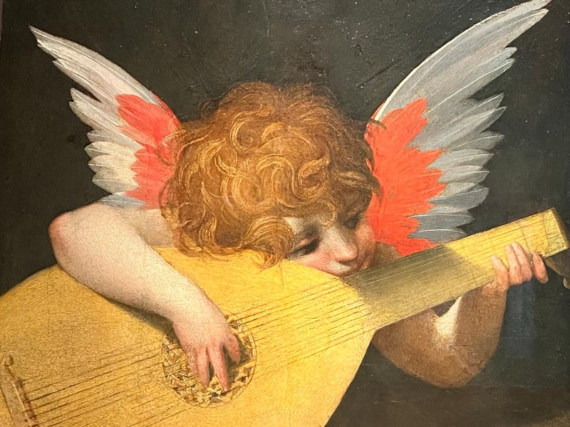 painting of angel playing a lute