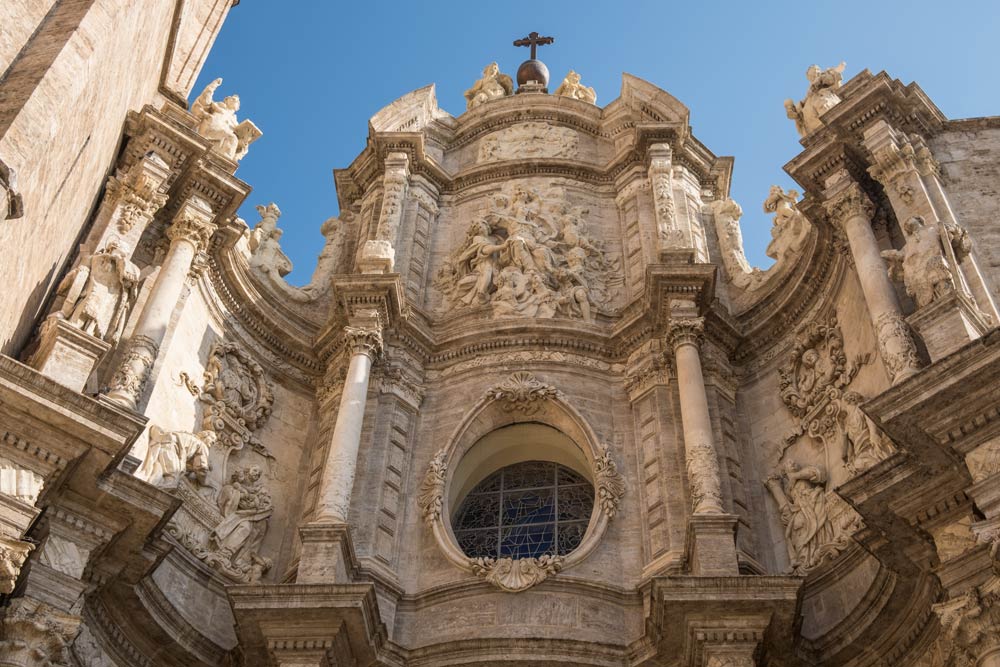 flamboyant sculptures above entrance to cathedral in valencia