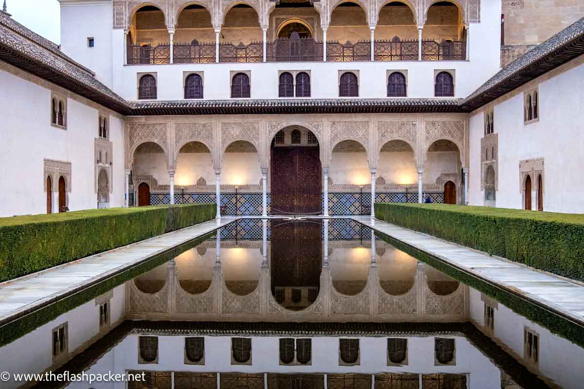 courtyard at alhambra palace with central reflecting pool