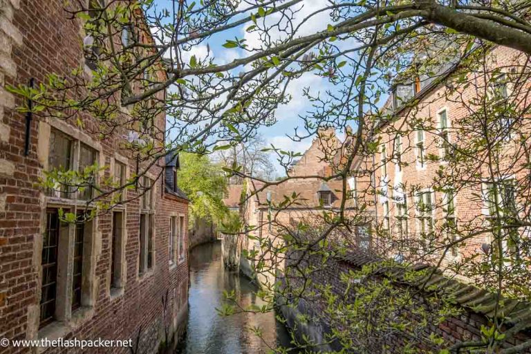 red brick buildings lining a narrow canal