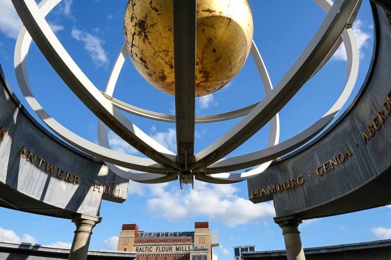 globe sculpture on newcastle quayside with baltic building in background