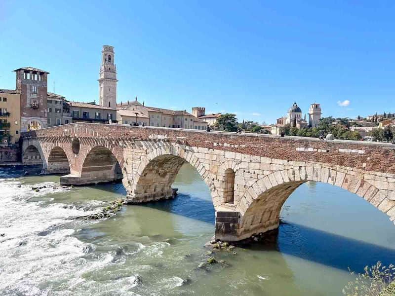 old stone bridge over a river in verona in italy