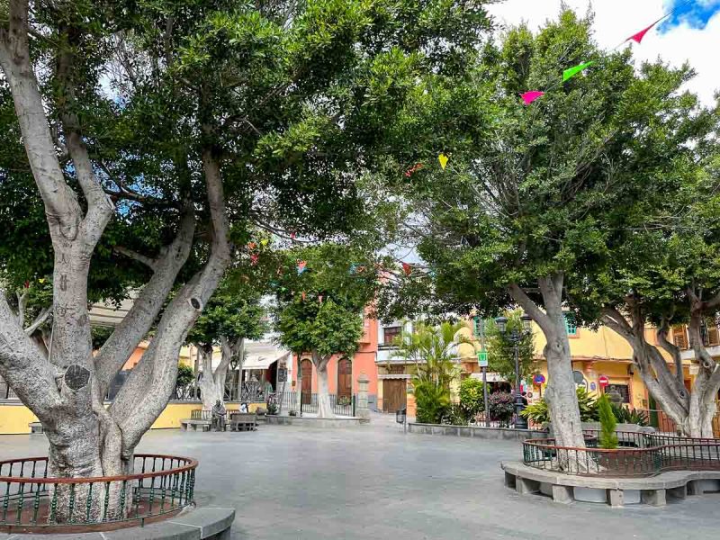 town square in aguimes gran canaria lined with ochre and yellow buildings