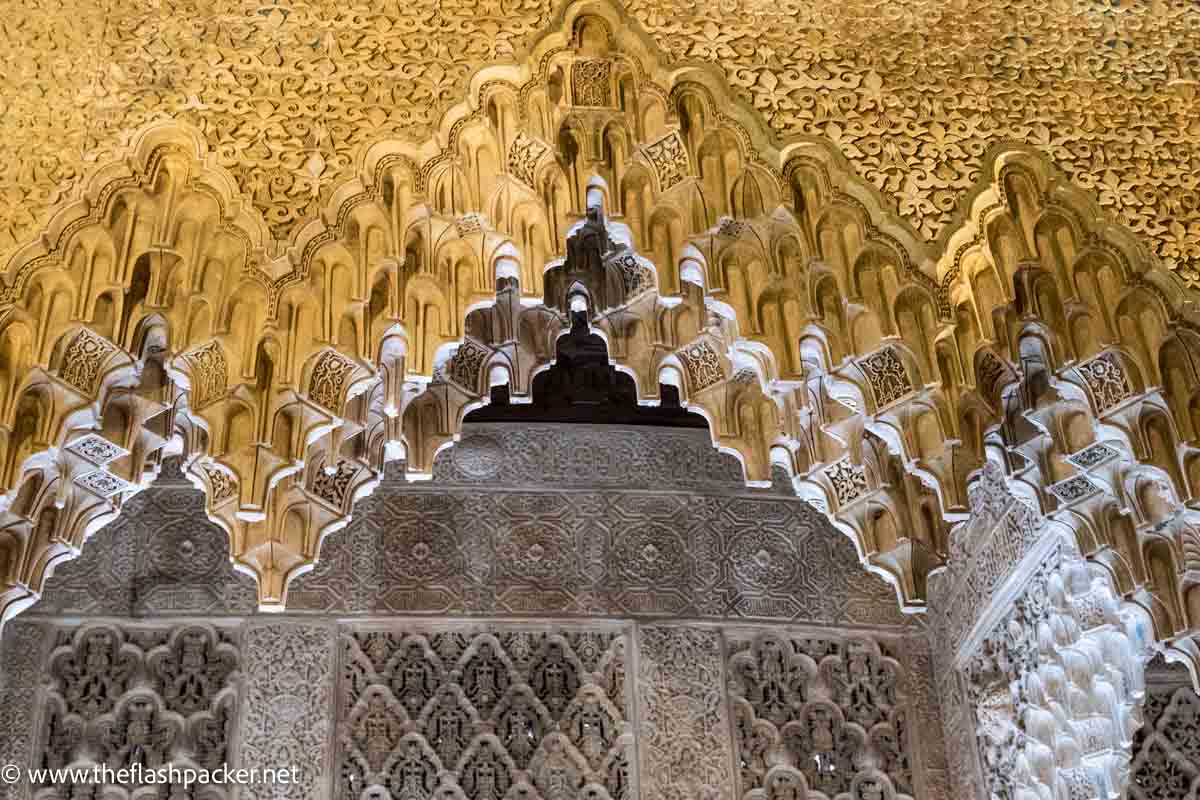 intricately carved stalagtite sculptures in ceiling at alhambra palace