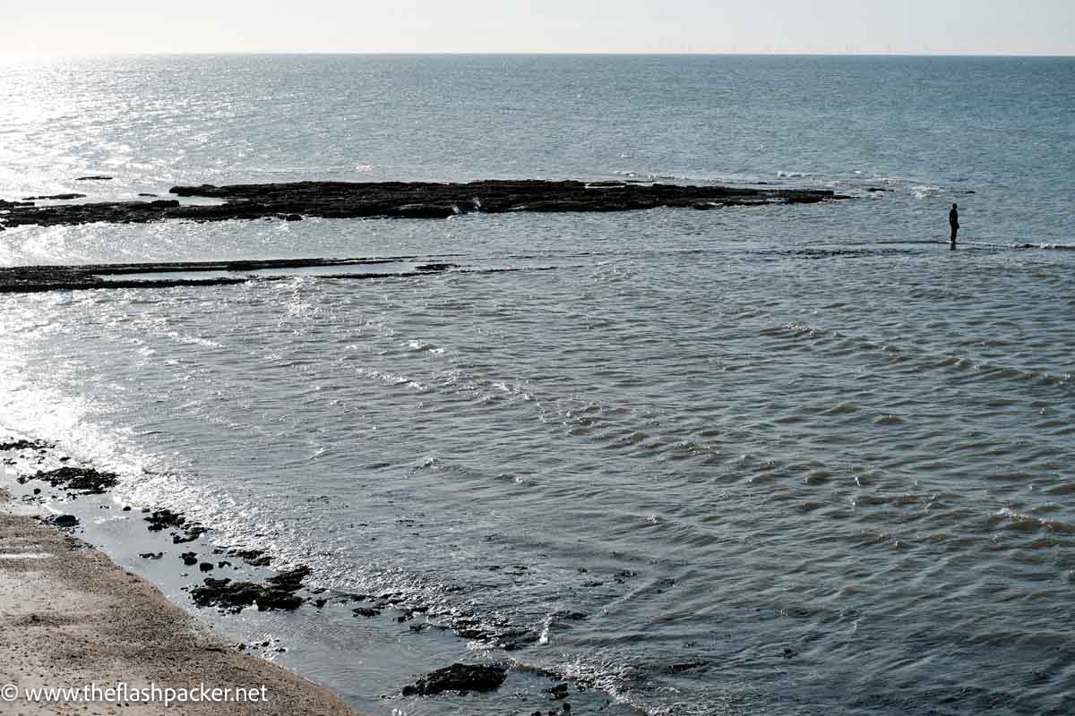 antony gormley statue pf man in sea at margate one of the best kent coast towns