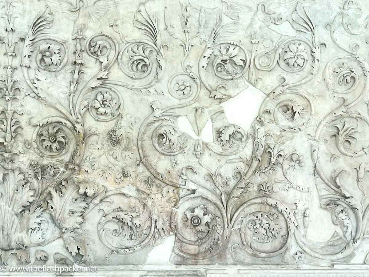 marble decorative swirls of ara pacis in rome