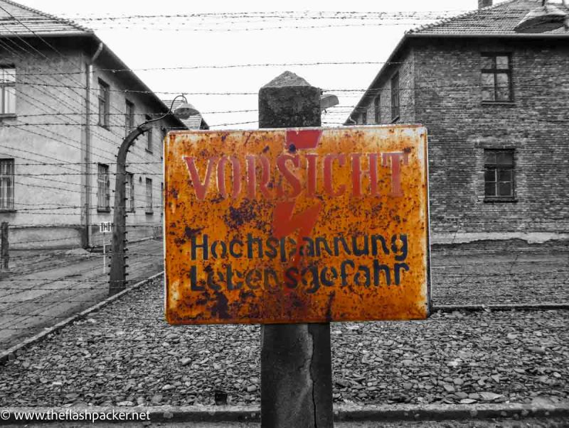 warning sign at auschwitz camp