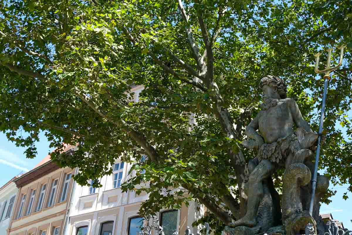 sculpture of the god neptune with a trident