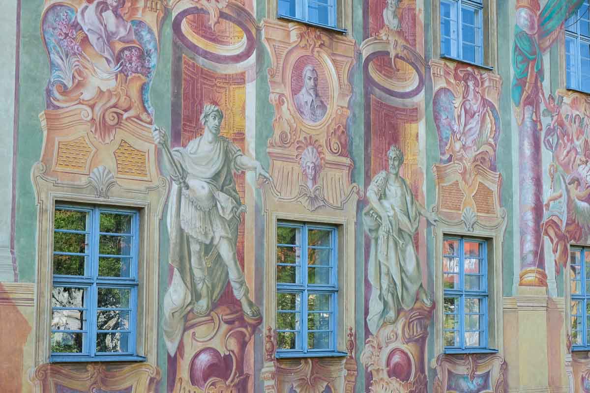 frescos painted on the outside of a building