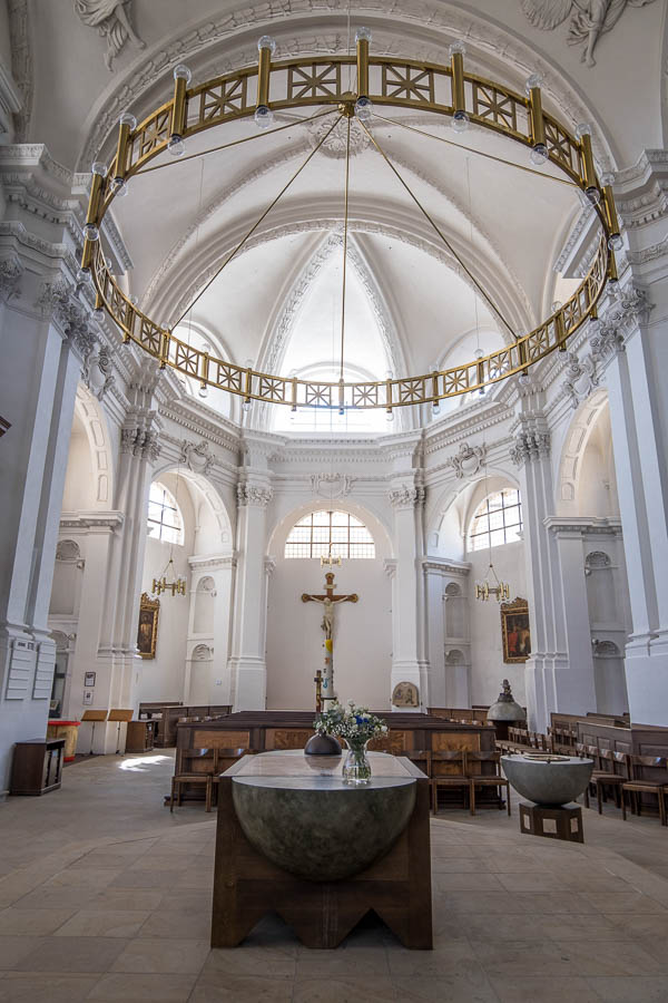 simple whitewashed interior of st srephans church in bamberg germany