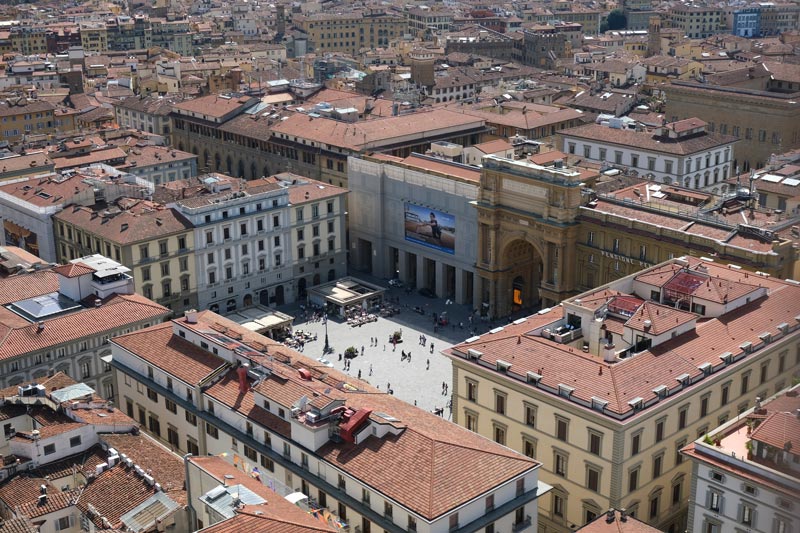 aerila view of rectangular piazza in florence with trimphal arch