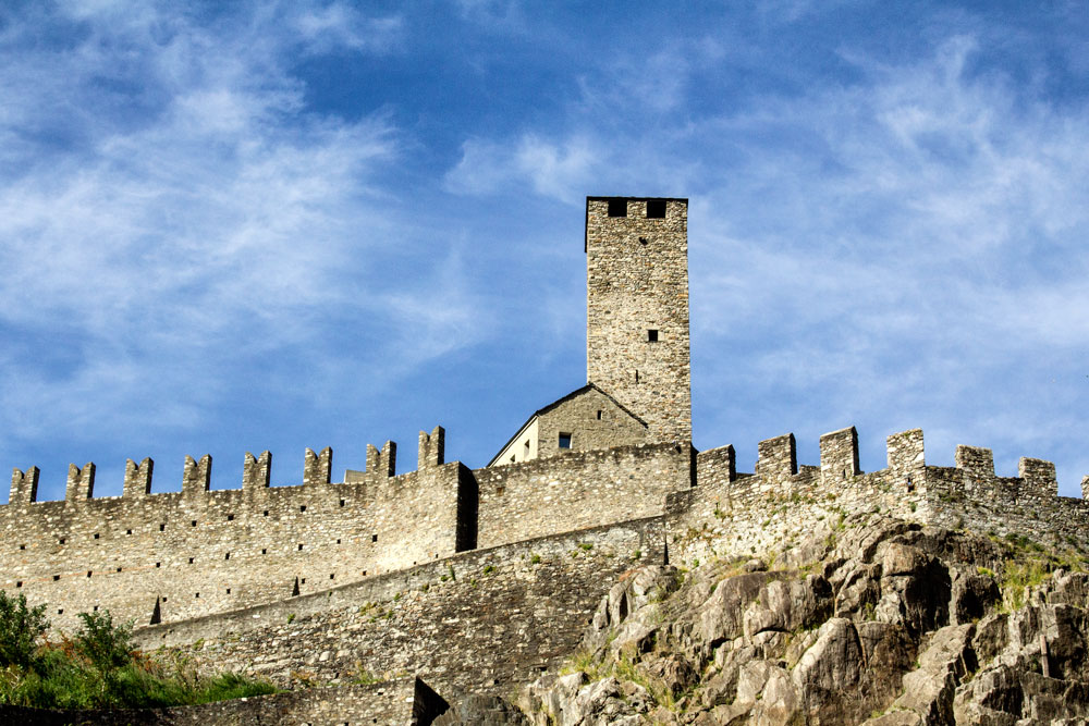 walls of old fortified castle with turret in bellinzona