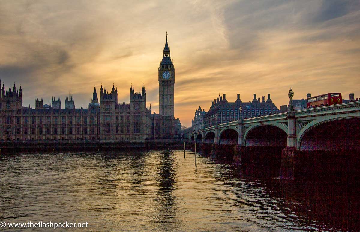 houses of parliament and big ben at sunset