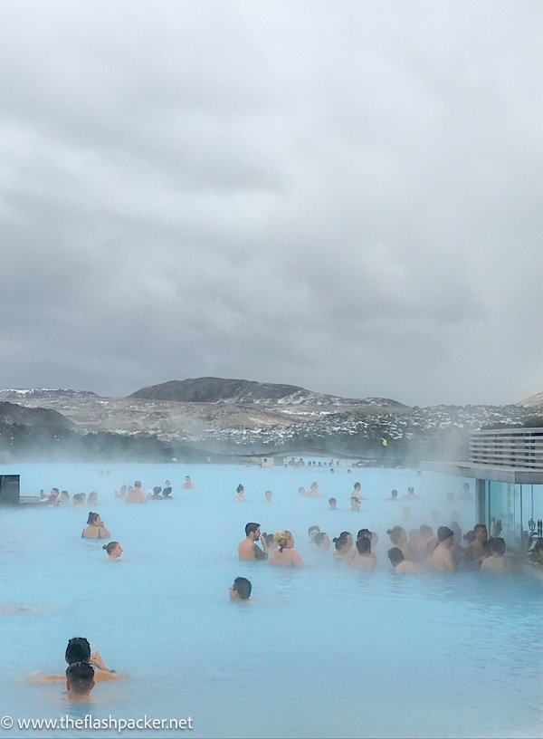 people in the water at blue lagoon iceland