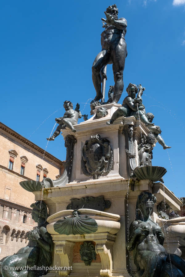 monumental fountain with bronze sculpture of neptune