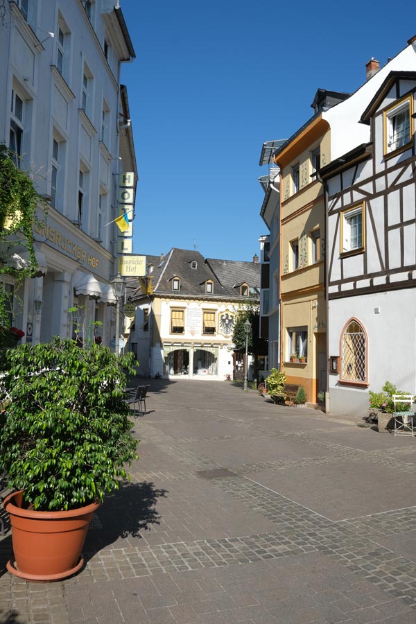 small pretty square in boppard germany with plant pots outside medieval buildings