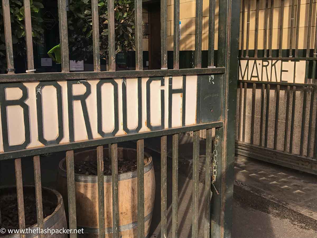 sign for borough market on open cast iron gate