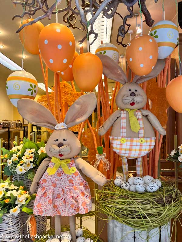 fabric easter bunnies with orange and white balloons and chocolate eggs