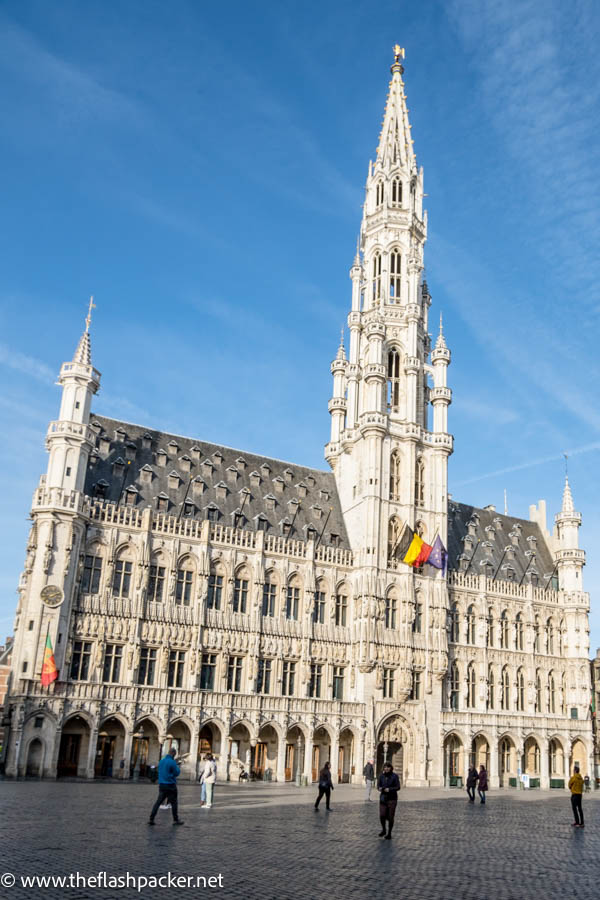 gothic building in brussels grand place with soaring tower