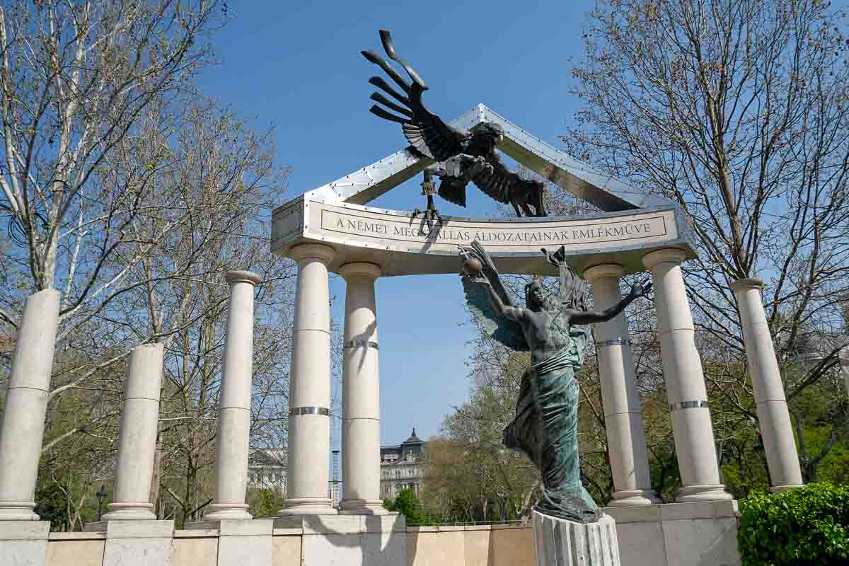 monument with bronze sculptures of an angel and eagle