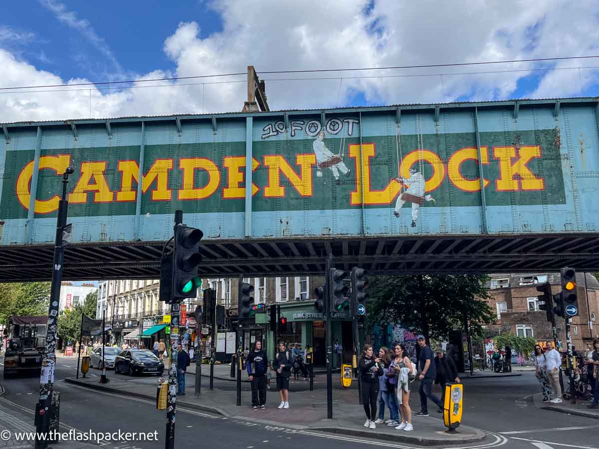 camden lock bridge in london and main road below