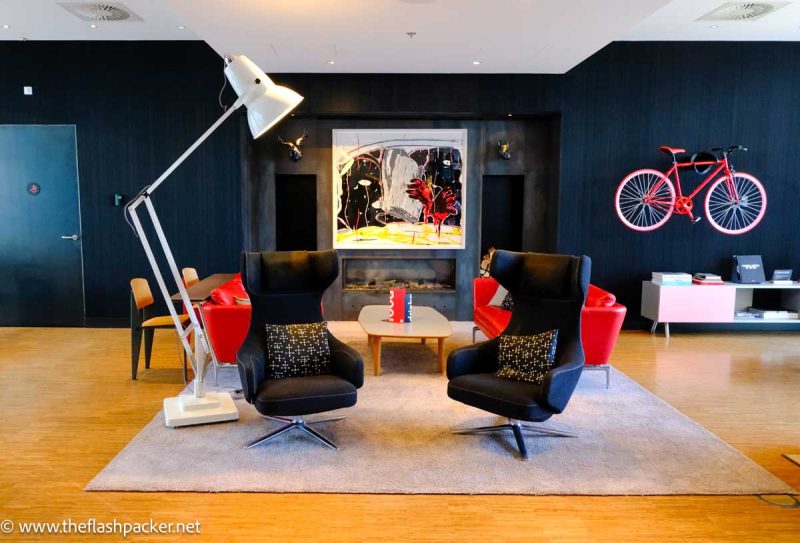 two chairs and a lamp in one of citizenM Rotterdam's living rooms