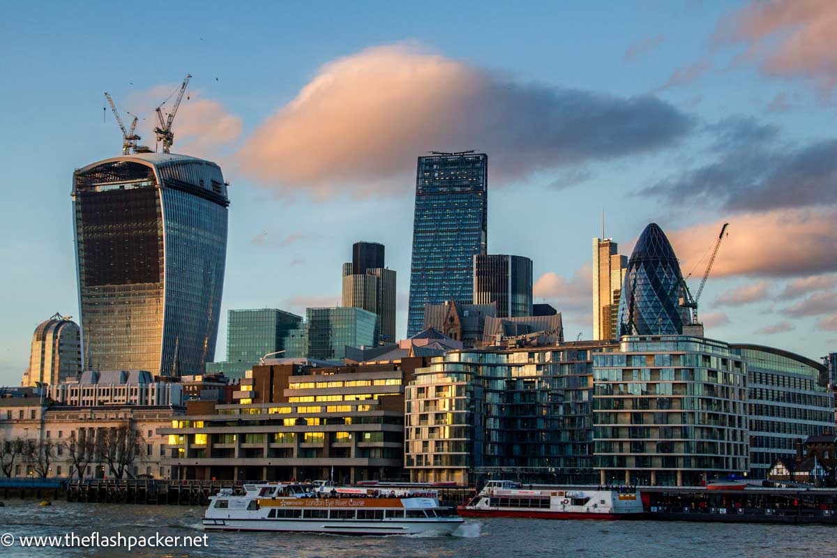 city skyline with the gherkin and walkie talkie building at sunset