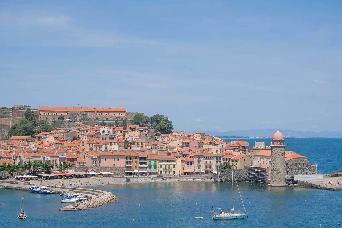 view of a pretty harbour and beach in collioure france