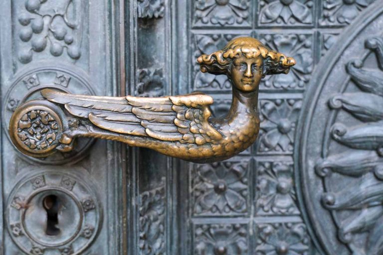 intricately carved door handle of cologne cathedral