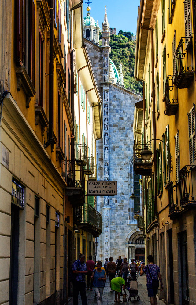 narrow shaded street in italian city