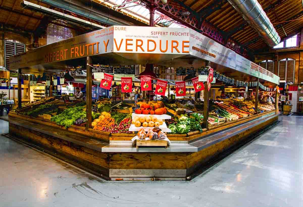 fruit and vegetable stall in covered market