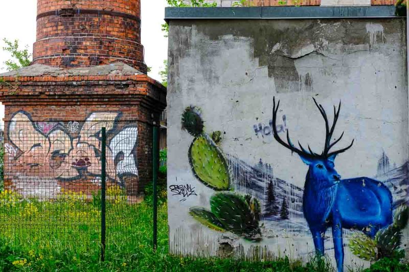 mural of a blue deer on a wall