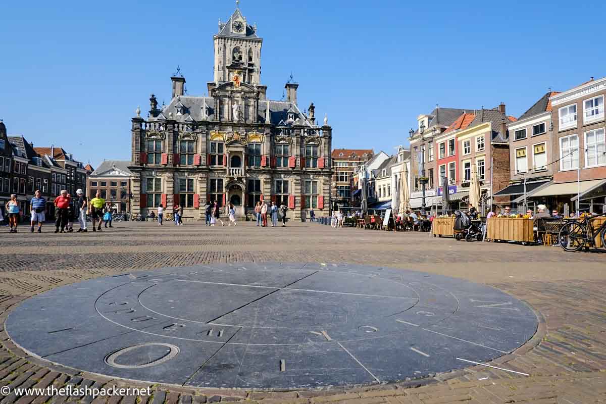 market square with large gabled building one of the best things to do in delft