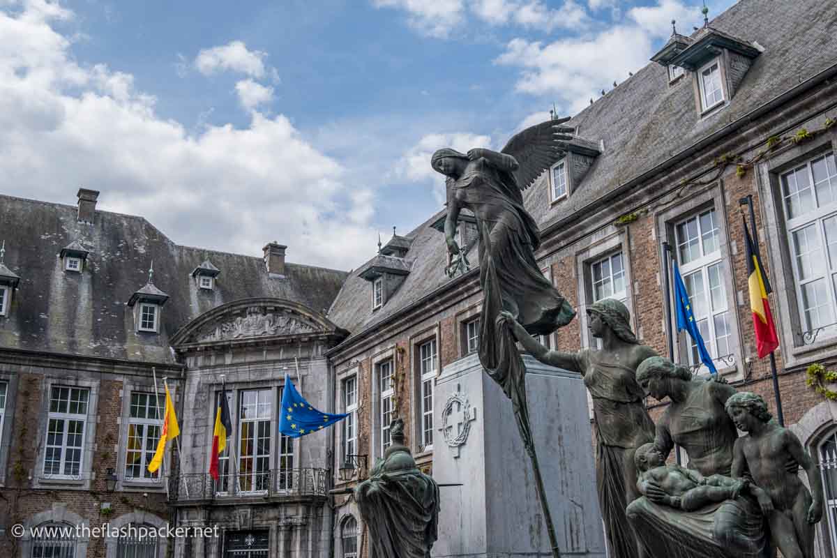 carved bronze figures of war memorial in dinant wallonia