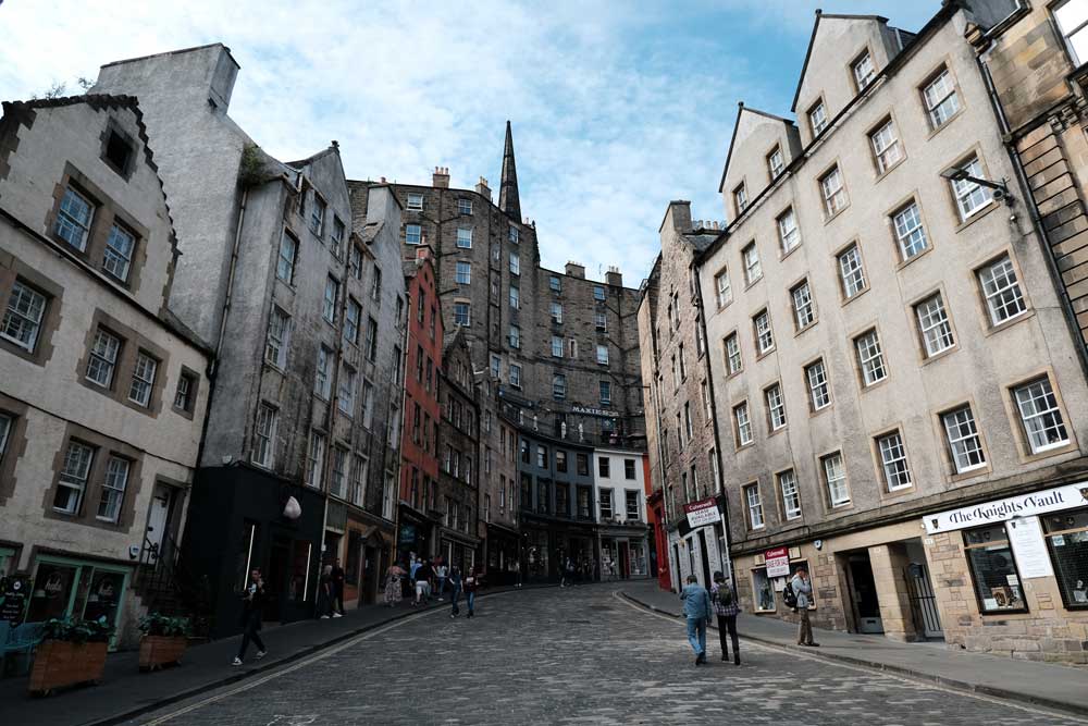 old buildings lining street in edinburgh