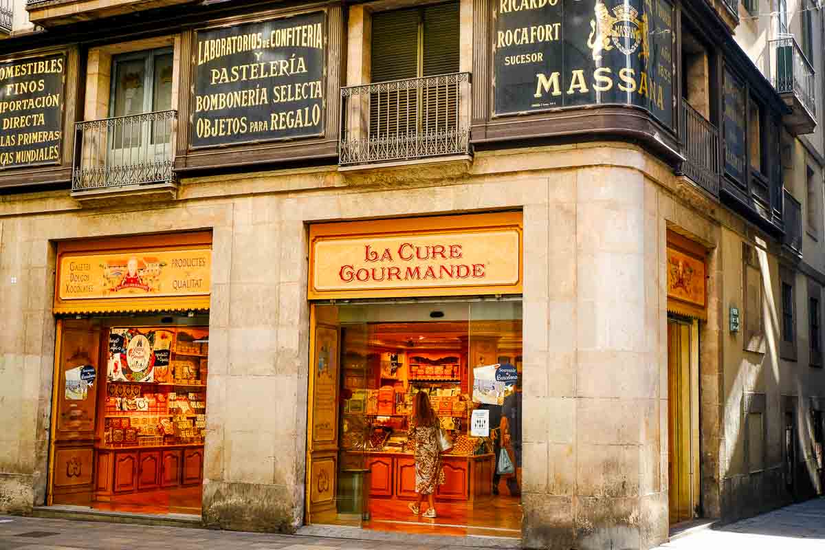 woman at counter in old spanish food shop