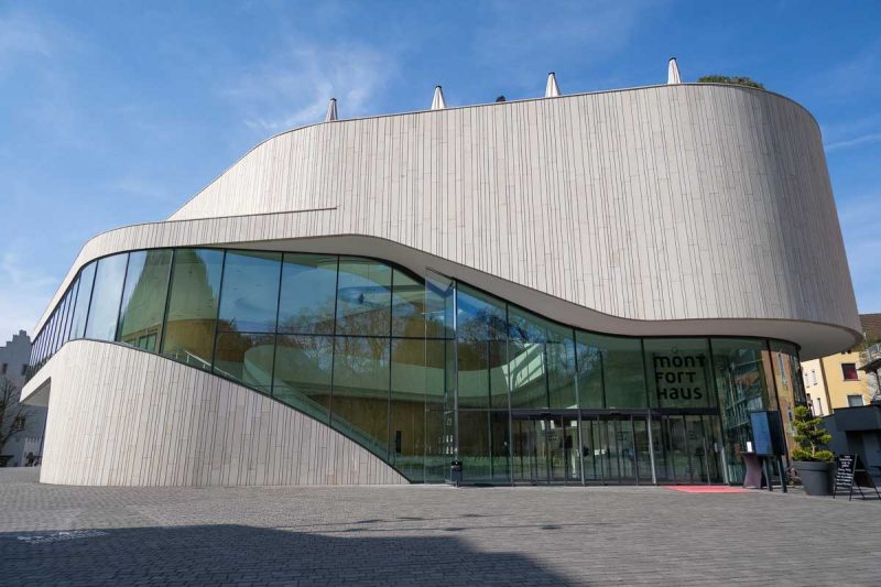 curved modern concrete and glass exterior offeldkirch montforthaus